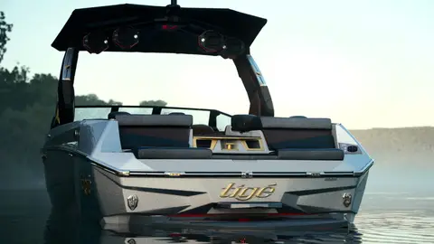Strong rear boat hero with Tige mark, clean reflection, and lake atmosphere.