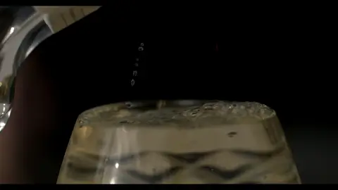 Third-pass frame candidate. Source-level review: Bottle, pour, and glass frames are composed and polished, but this is alcohol/product-label material rather than core GLM machine imagery. Individual frame still requires close visual review unless source-level decision is reject.