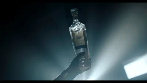 Third-pass frame candidate. Source-level review: Bottle, pour, and glass frames are composed and polished, but this is alcohol/product-label material rather than core GLM machine imagery. Individual frame still requires close visual review unless source-level decision is reject.