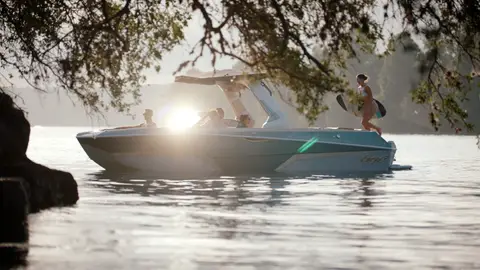 Third-pass frame candidate. Source-level review: Good water, boat, wake, and outdoor motion frames. Some faces, property, and boat/brand context still need review. Individual frame still requires close visual review unless source-level decision is reject.