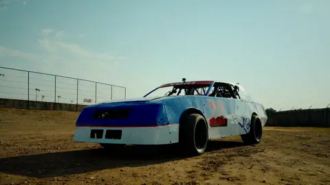 Third-pass frame candidate. Source-level review: Strong motorsport/car frames. This pass avoids the known muddy car-blur window and includes cleaner track, vehicle, and detail moments. Individual frame still requires close visual review unless source-level decision is reject.
