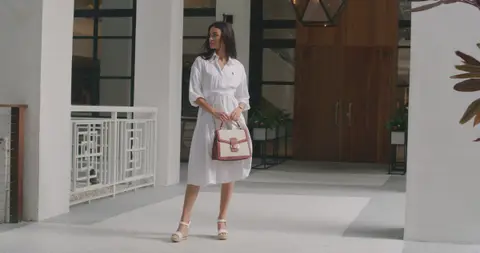USPA Resort White Dress Walkway. lifestyle visual reference, composition and color reference.