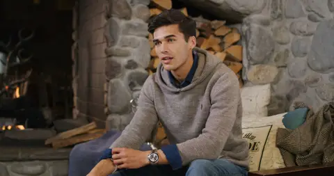 USPA Fireplace Gray Sweater Portrait. lifestyle visual reference, composition and color reference.