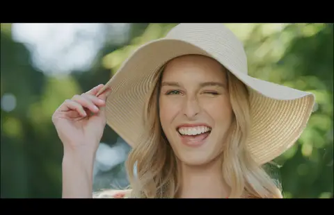 USPA Sun Hat Laughing Portrait. lifestyle visual reference, composition and color reference.