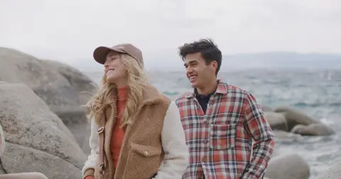 USPA Plaid Couple Rocky Shore Walk. lifestyle visual reference, composition and color reference.