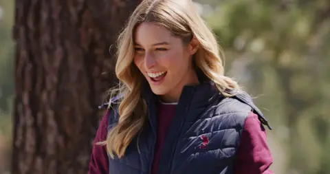 USPA Navy Vest Lakeside Smile. lifestyle visual reference, composition and color reference.