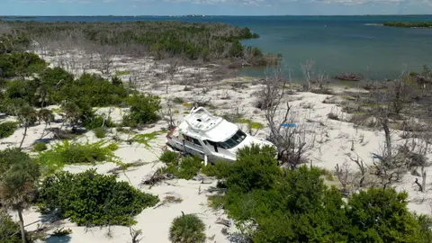 Strong shipwreck/coastal aerial with clear subject and place texture.