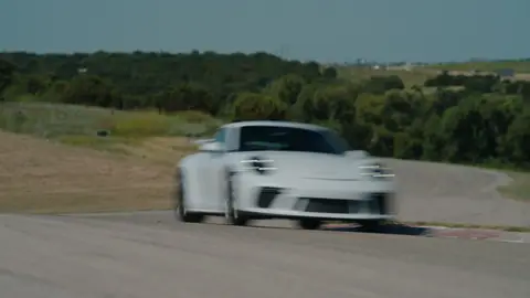 Dynamic front Porsche approach with useful speed, but the vehicle remains intentionally soft.