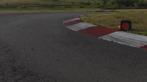 Useful wider curb and marker composition, but secondary to the cleaner track-detail selects.