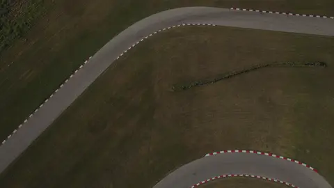 Strong top-down track geometry with repeated curves and a clean abstract motorsport pattern.