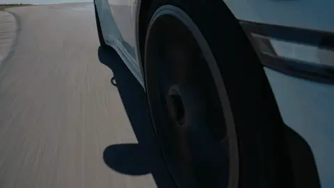 Strong wheel-rig motion beat with clear speed and track texture.