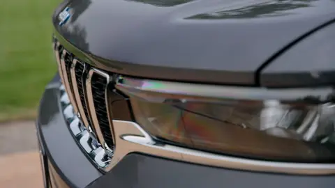 Clean headlight/detail texture, but it is tight and secondary.
