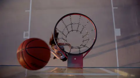 Basketball/hoop detail has motion energy but is less clean than the stronger rim frame.