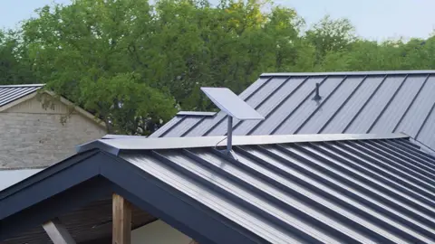 Strong rooftop dish install frame with clear product, roofline, and residential context.